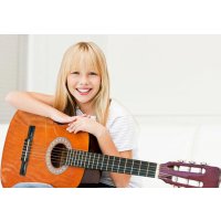 Уроки музыки: гитара для ребенка младшего школьного возраста