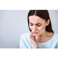 Ушиб зуба: симптомы и лечение